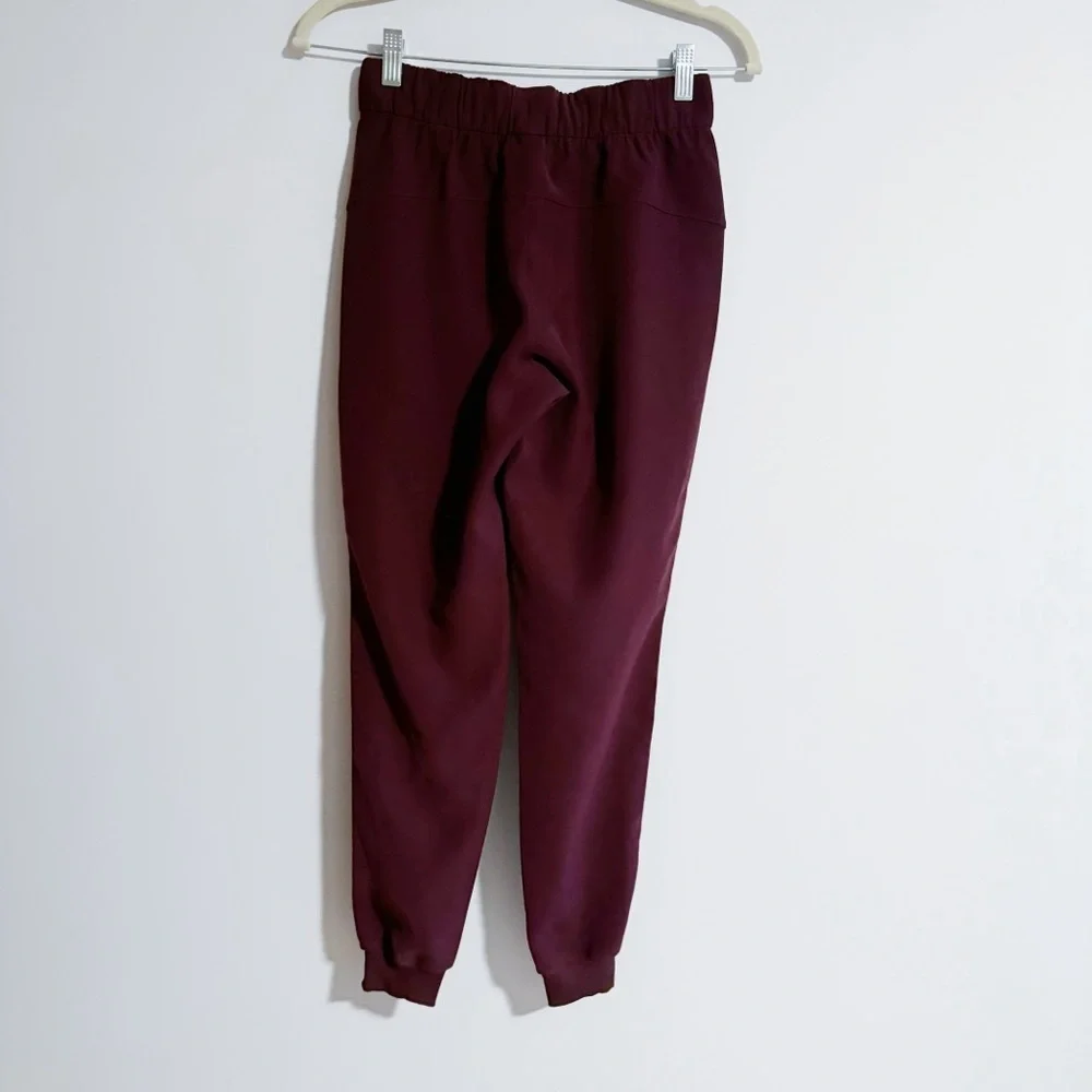 Lululemon - Burgundy On The Fly Woven Jogger Pants